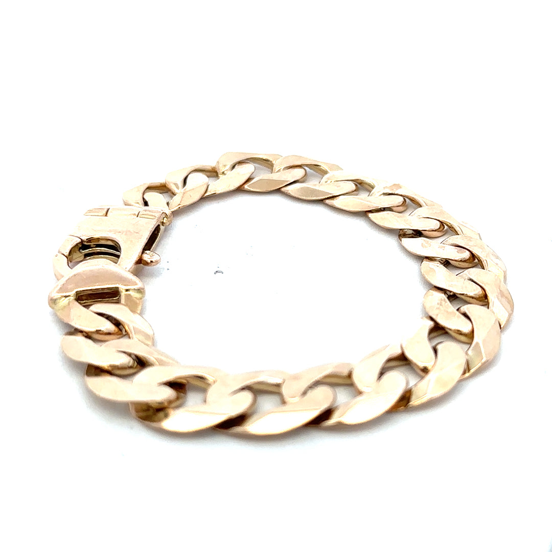 9ct yellow gold curb bracelet weighing 48.1g, featuring classic linked design, by Reeves and Sons