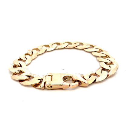 9ct yellow gold curb bracelet weighing 48.1g with a polished finish, featuring classic interlinked gold links.