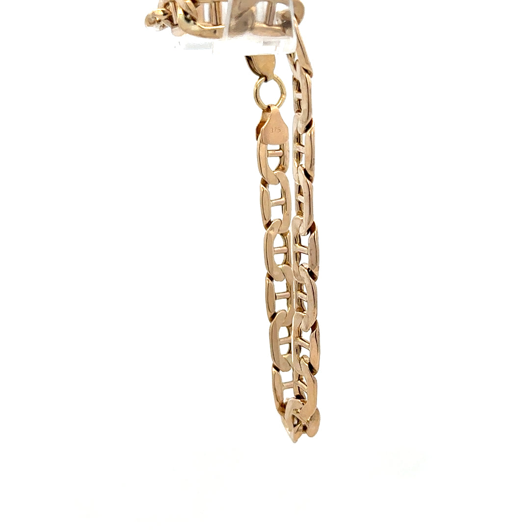 9ct yellow gold bracelet weighing 7.4g, featuring a delicate chain design, from Reeves and Sons.