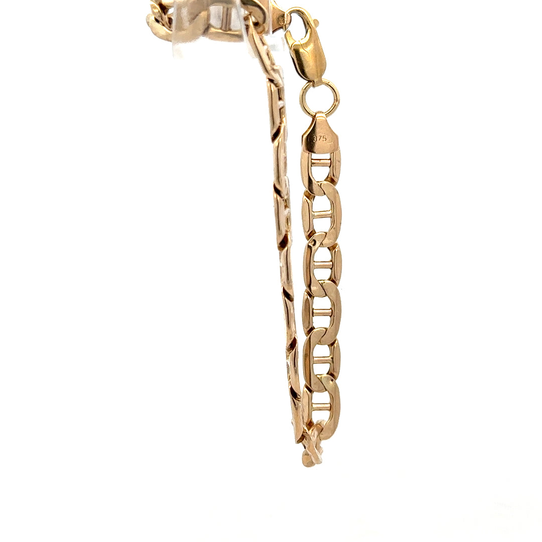 9ct yellow gold bracelet weighing 7.4g, featuring a sleek design, from Reeves and Sons. Fine jewelry accessory with polished finish.