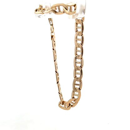 9ct yellow gold bracelet weighing 7.4g, from Reeves and Sons, featuring a sleek, polished design with secure clasp.