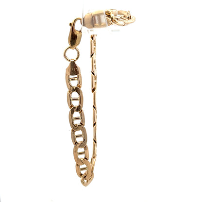 9ct yellow gold bracelet weighing 7.4g with intricate link design, crafted by Reeves and Sons.