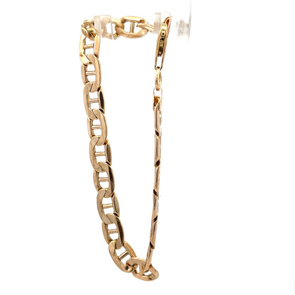 9ct yellow gold bracelet weighing 7.4g with a delicate chain design, crafted by Reeves and Sons.