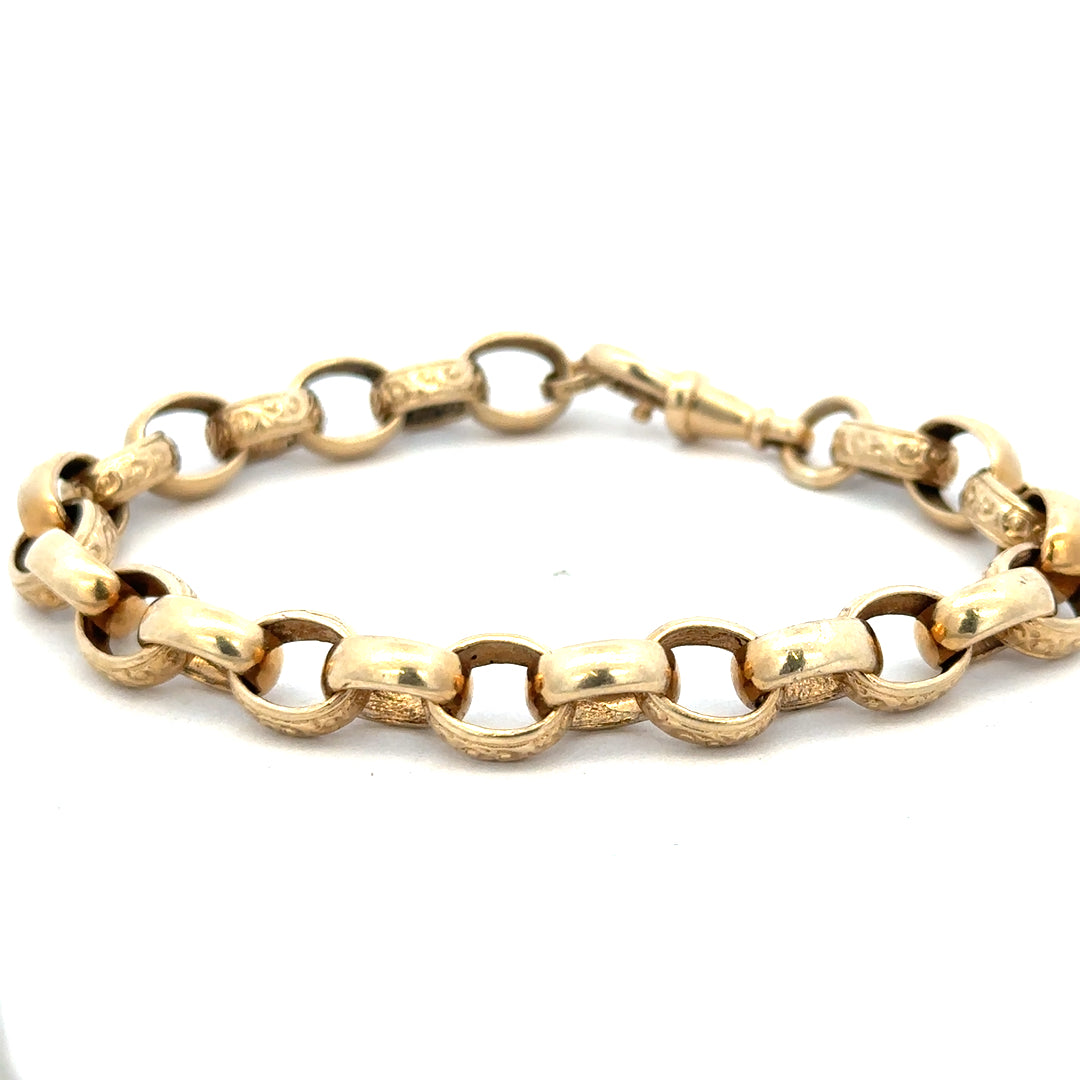 9ct yellow gold belcher bracelet weighing 21.7g with linked chain design, crafted by Reeves and Sons.
