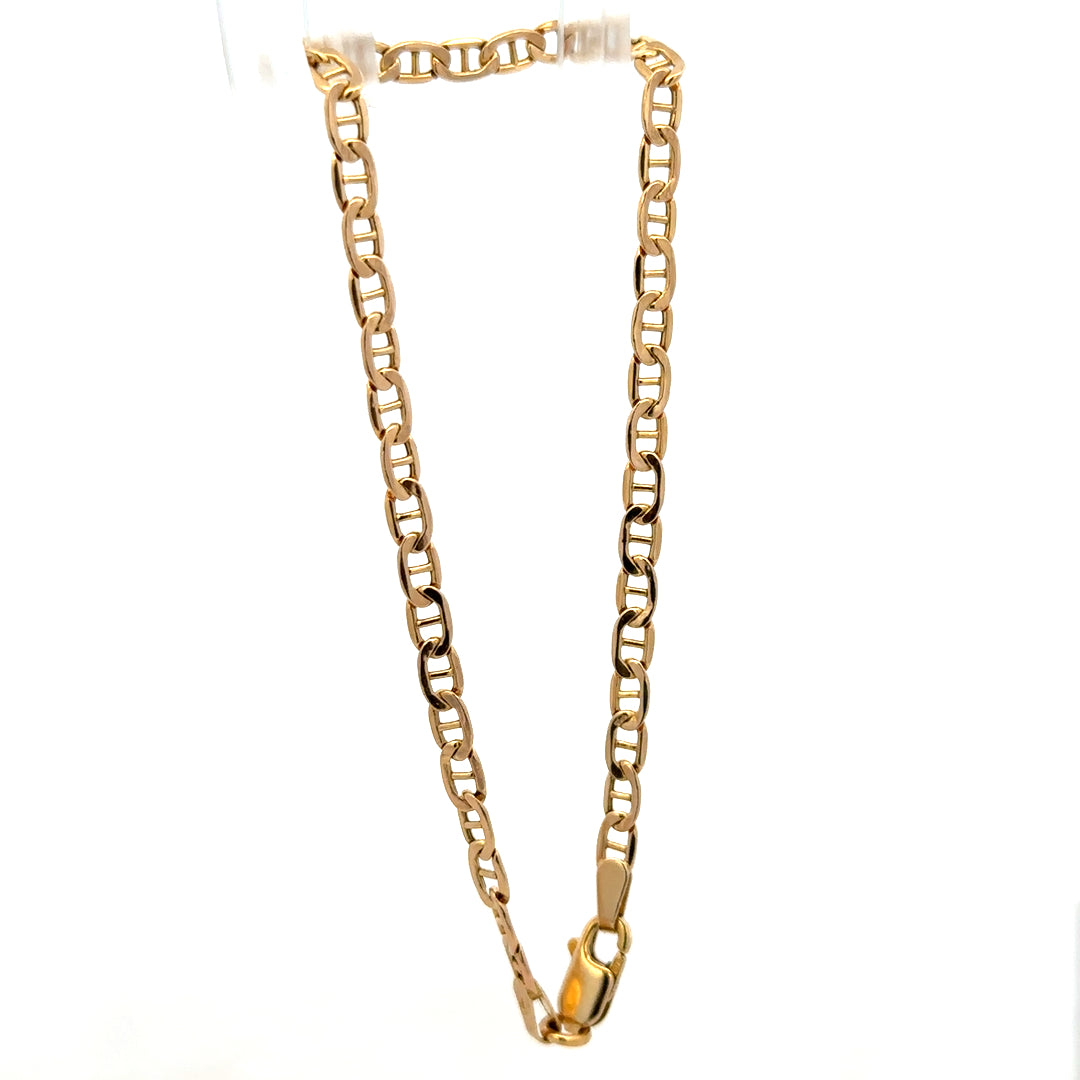 9ct yellow gold bracelet weighing 1.9g, featuring a delicate chain design, from Reeves and Sons.
