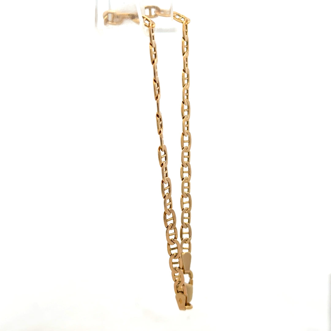 9ct yellow gold bracelet weighing 1.9g, featuring a sleek chain design, crafted by Reeves and Sons.