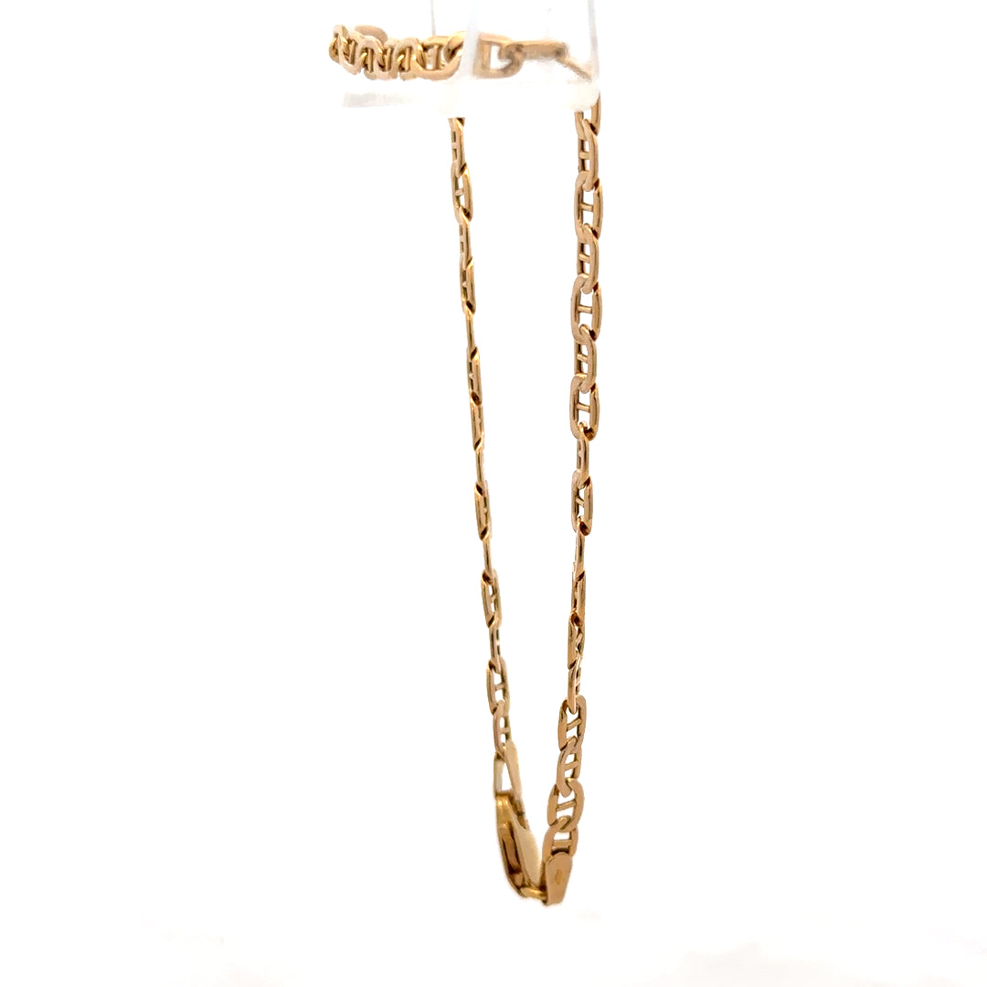 9ct yellow gold bracelet weighing 1.9g, featuring a delicate chain design, from Reeves and Sons.
