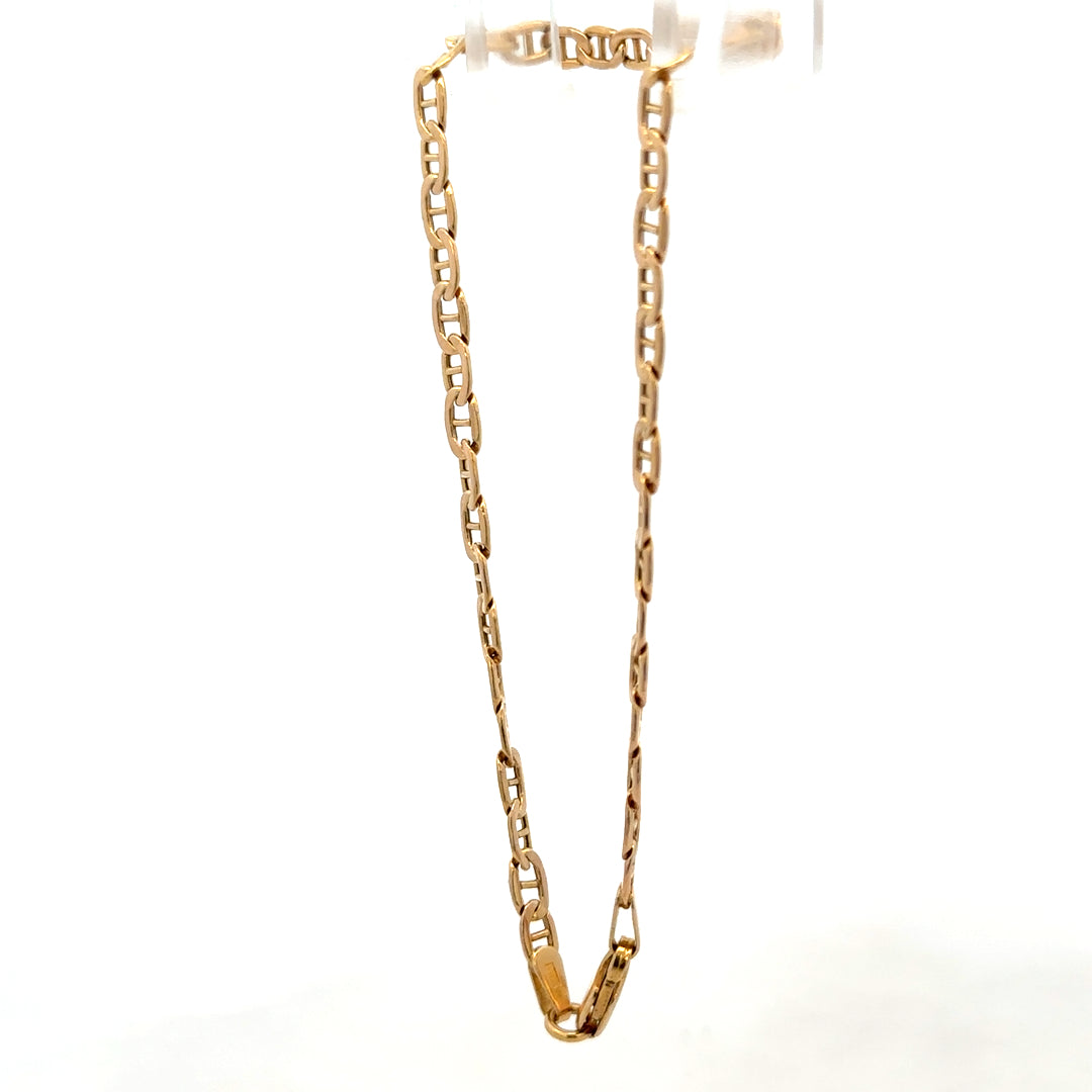 9ct yellow gold bracelet weighing 1.9g, featuring a delicate chain design, from Reeves and Sons.