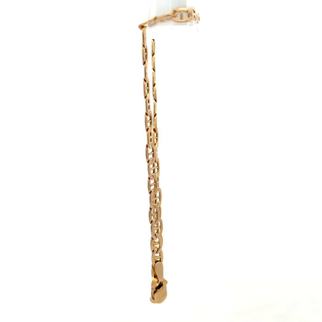 9ct yellow gold bracelet weighing 1.9g, crafted by Reeves and Sons, featuring a sleek chain design.