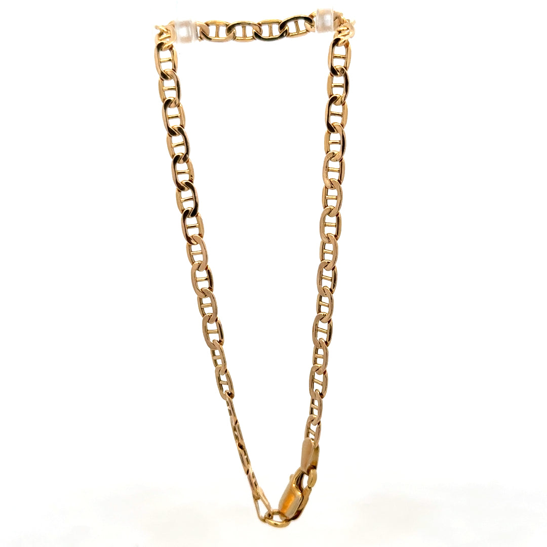9ct yellow gold bracelet weighing 1.9g with a delicate chain design, crafted by Reeves and Sons.