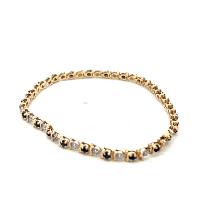 9ct yellow gold sapphire and diamond bracelet with intricate link design, weighing 6.5g, from Reeves and Sons.