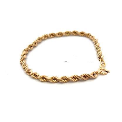 9ct yellow gold rope bracelet weighing 2.4g, featuring a twisted rope design, with a Reeves and Sons brand clasp.