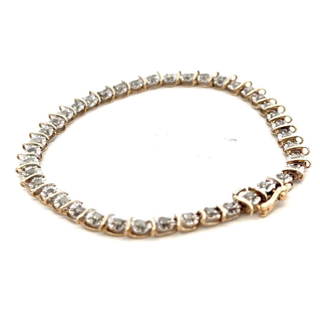 9ct yellow gold diamond bracelet with intricate links, weighing 5.9g, featuring sparkling diamonds from Reeves and Sons.