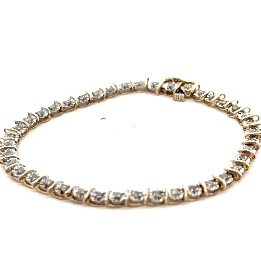 9ct yellow gold diamond bracelet with sparkling diamonds, weighing 5.9g, featuring delicate links and elegant craftsmanship.