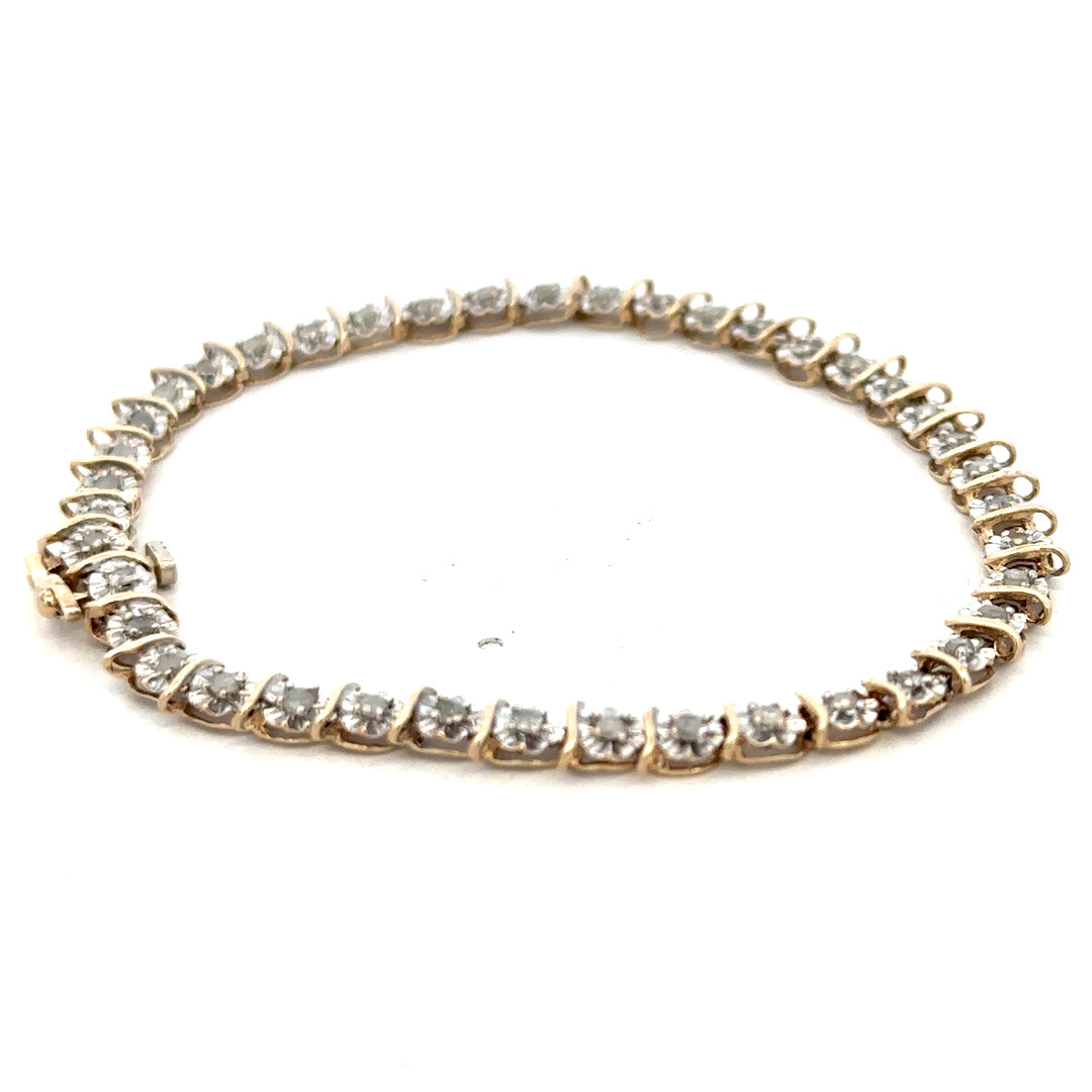 9ct yellow gold diamond bracelet with delicate link design, weighing 5.9g, from Reeves and Sons.