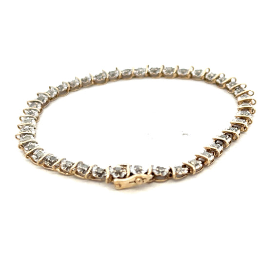 9ct yellow gold diamond bracelet weighing 5.9g with sparkling diamonds, crafted by Reeves and Sons.
