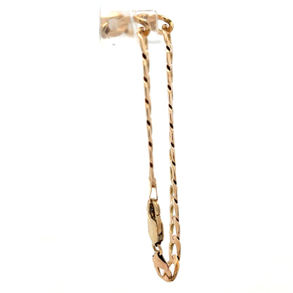 9ct yellow gold curb bracelet weighing 10.6g, featuring a classic chain design by Reeves and Sons.