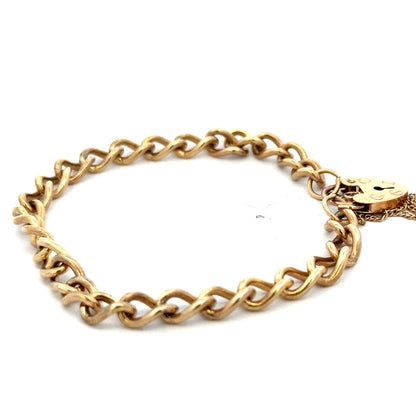 9ct yellow gold bracelet weighing 13.2g with intricate link design, crafted by Reeves and Sons.