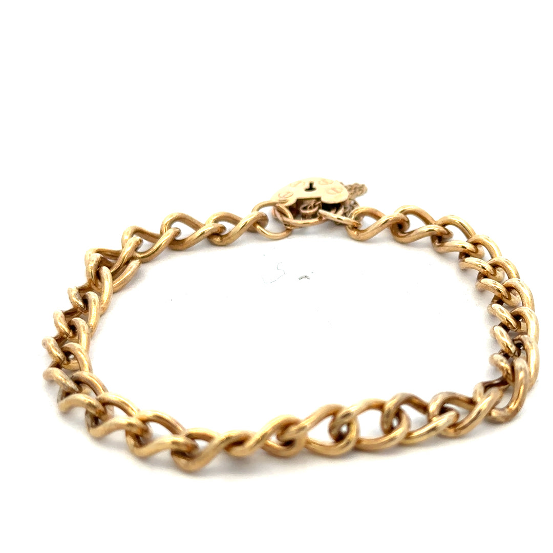 9ct yellow gold bracelet weighing 13.2g with intricate link design, crafted by Reeves and Sons.