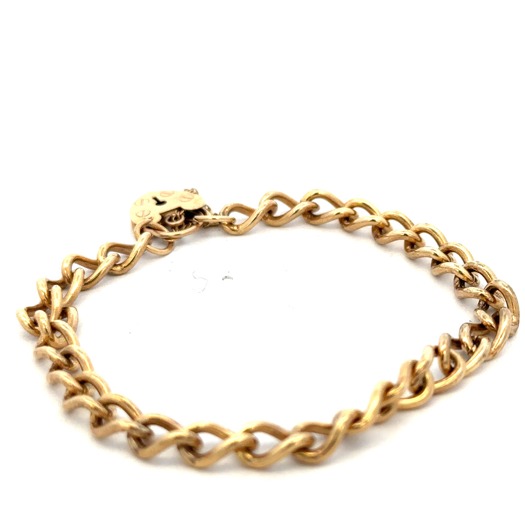 9ct yellow gold bracelet weighing 13.2g, featuring a classic chain design, crafted by Reeves and Sons, shown in close-up image.