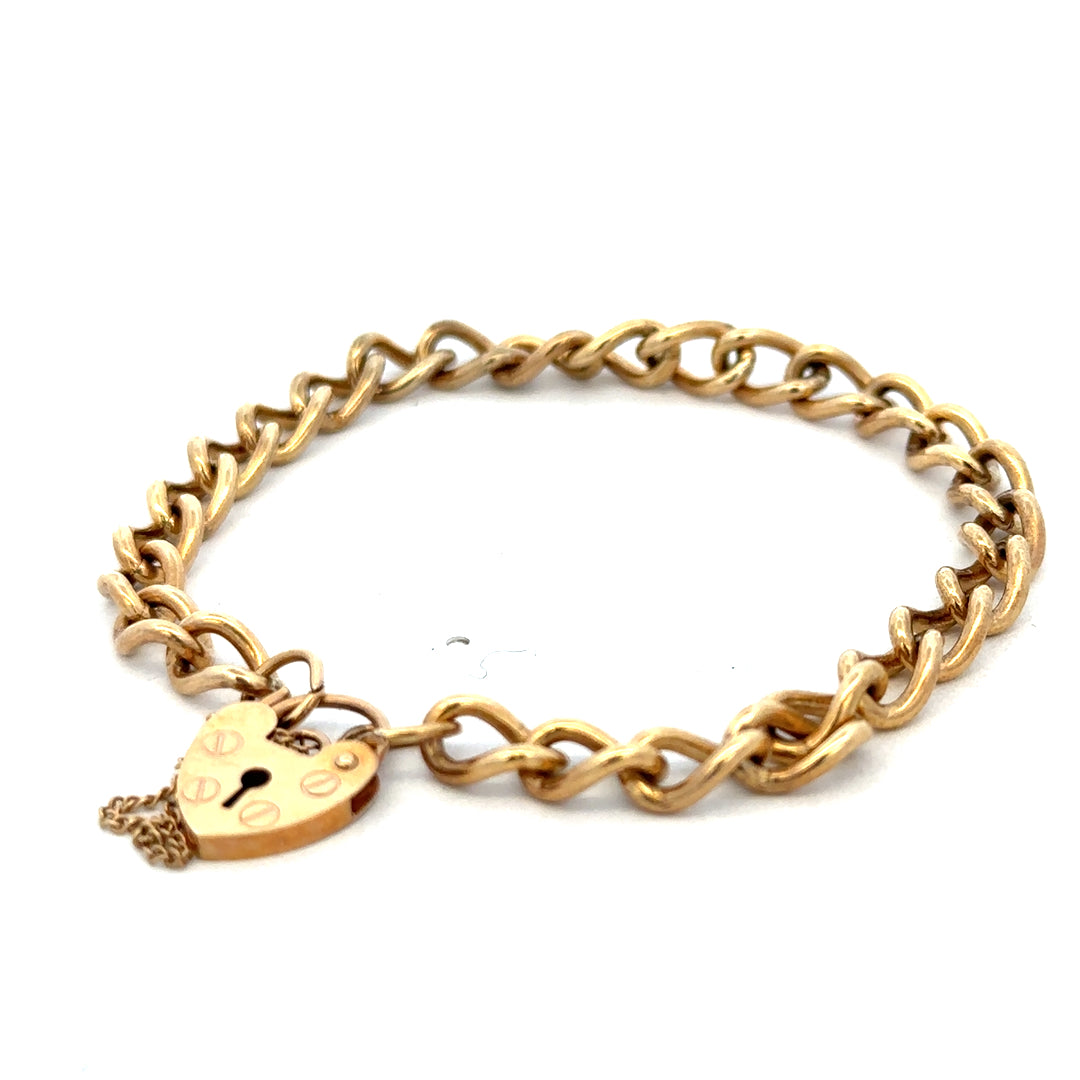 9ct yellow gold bracelet weighing 13.2g, featuring a classic link design, by Reeves and Sons.
