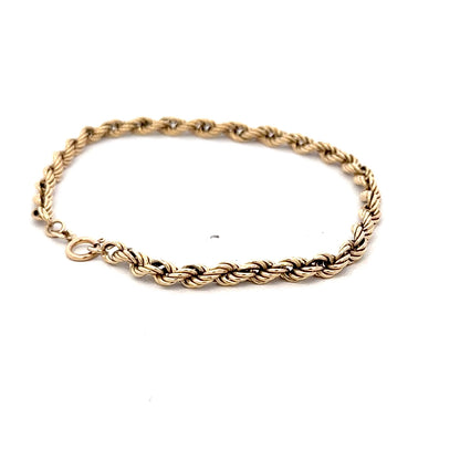 9ct yellow gold rope bracelet weighing 2.8g, featuring a twisted chain design, crafted by Reeves and Sons.