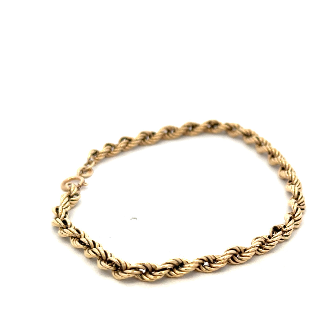 9ct yellow gold rope bracelet weighing 2.8g, featuring a twisted design, from Reeves and Sons.