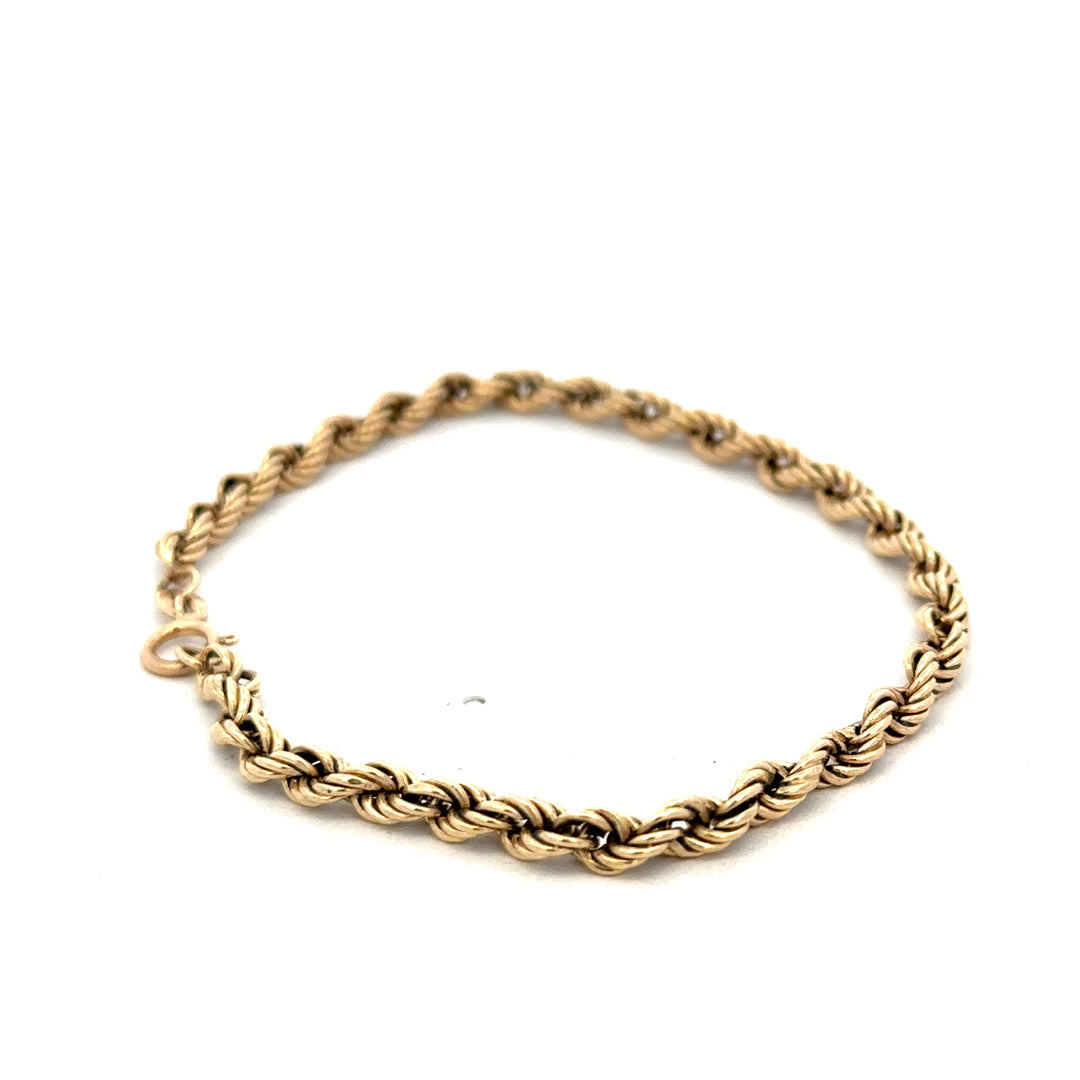 9ct yellow gold rope bracelet weighing 2.8g, featuring intricate twisted design and secure clasp, from Reeves and Sons.