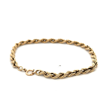 9ct yellow gold rope bracelet weighing 2.8g, with intricate twisted design, crafted by Reeves and Sons.