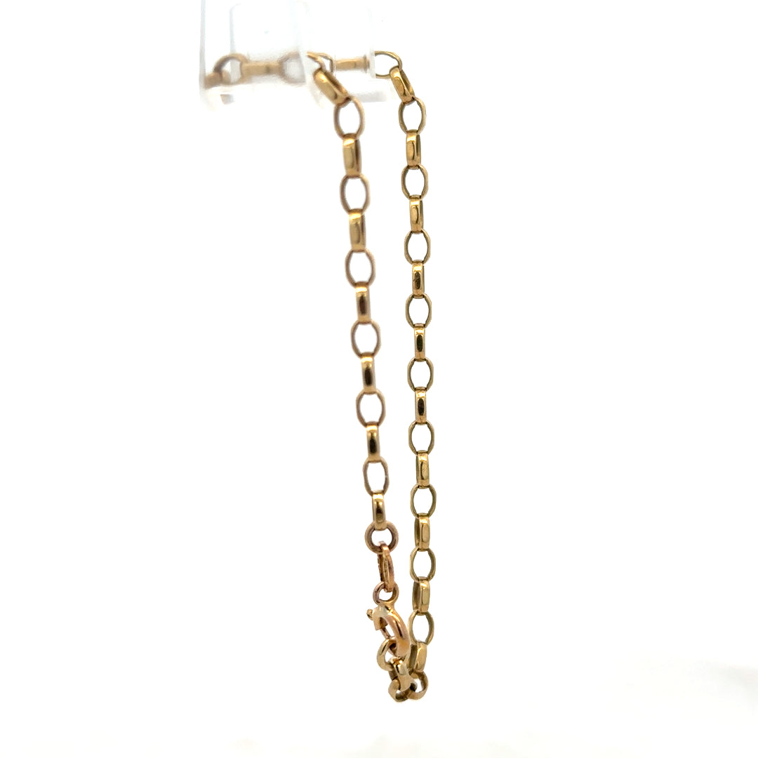 9ct yellow gold belcher bracelet with 3g weight from Reeves and Sons, close-up showing shiny, linked chain design.