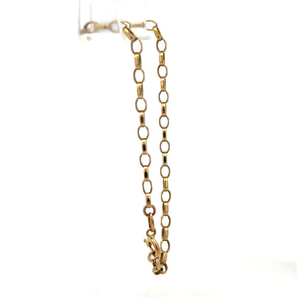 9ct yellow gold belcher bracelet with 3g weight from Reeves and Sons, close-up showing shiny, linked chain design.