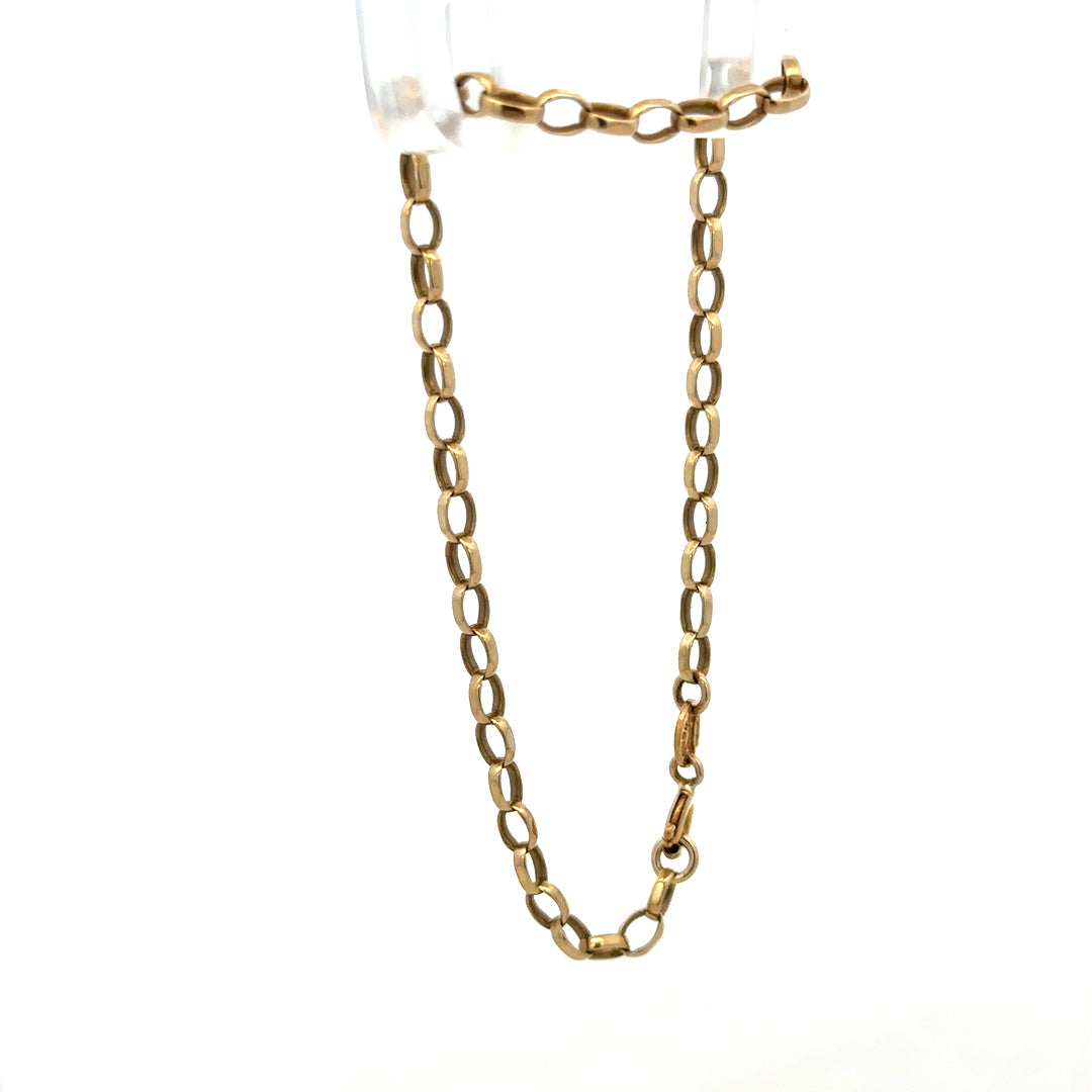 9ct yellow gold belcher bracelet with 3g weight from Reeves and Sons, featuring interlinked chain design on a plain background.