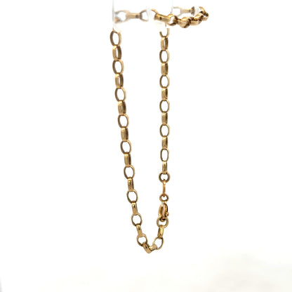 9ct yellow gold belcher bracelet with 3g weight, showcasing shiny links and classic design, by Reeves and Sons.
