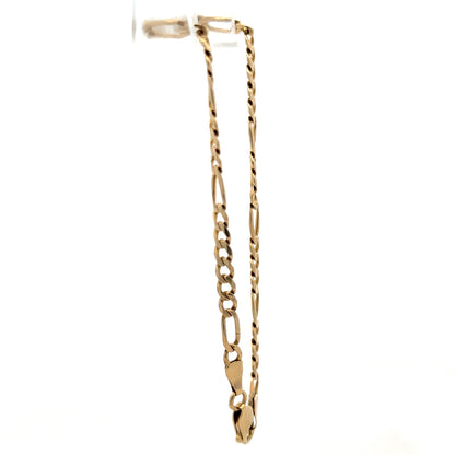 9ct yellow gold Figaro bracelet weighing 4.2g with linked chain design, crafted by Reeves and Sons.