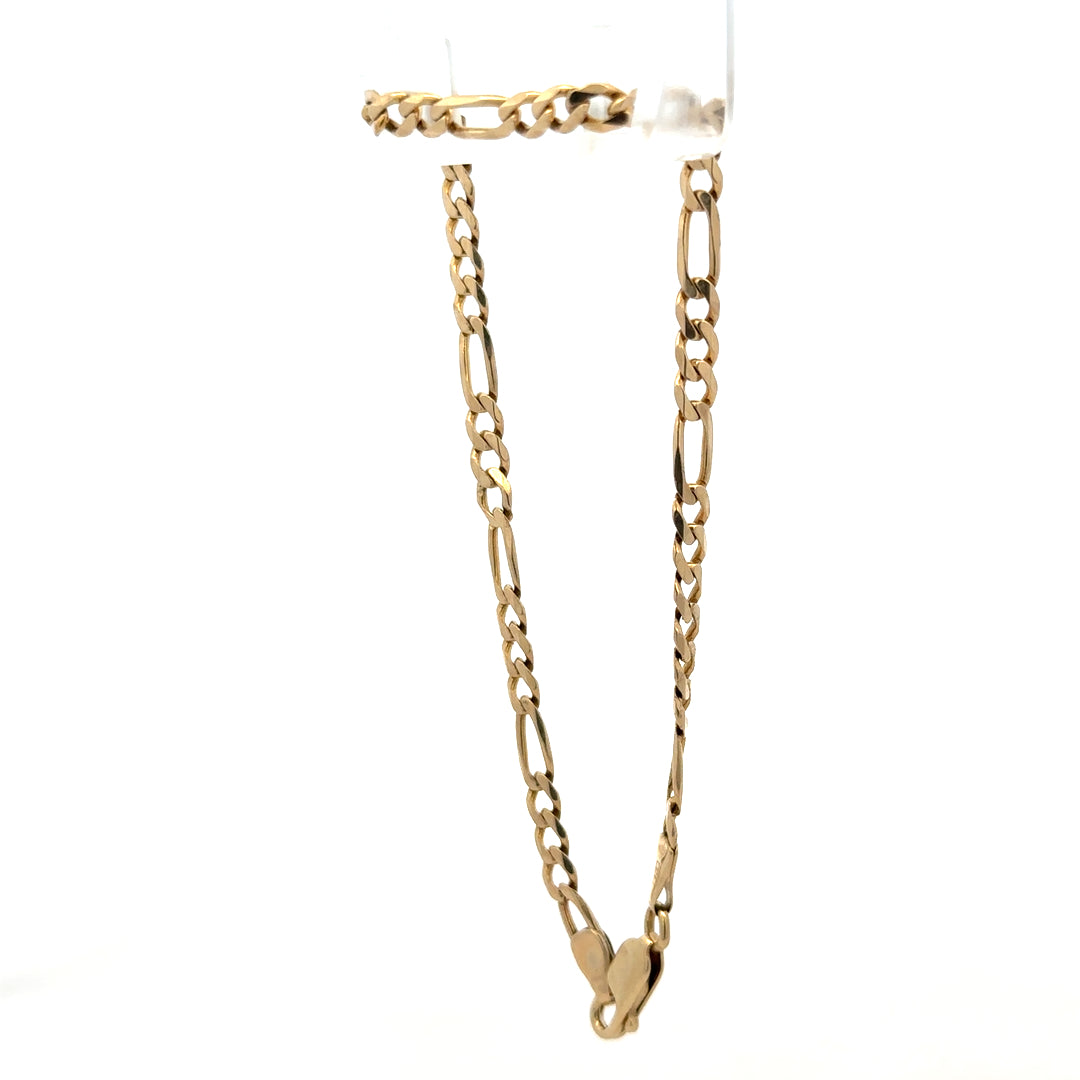 9ct yellow gold Figaro bracelet weighing 4.2g, featuring linked chain design, crafted by Reeves and Sons.