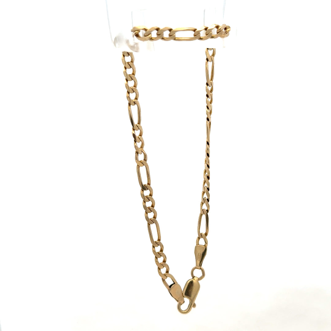 9ct yellow gold Figaro bracelet weighing 4.2g with linked chain design, crafted by Reeves and Sons.