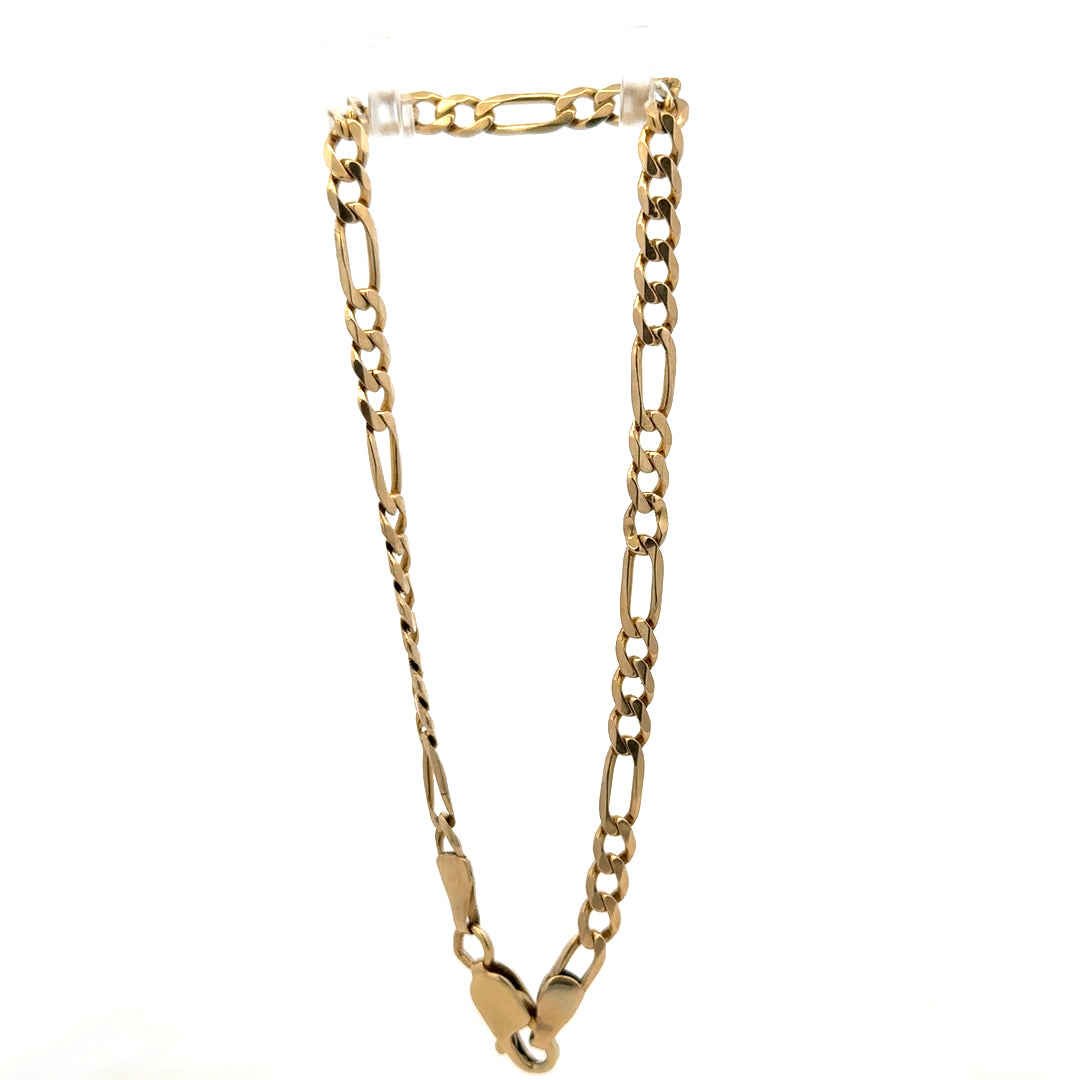 9ct yellow gold Figaro bracelet weighing 4.2g, featuring interlinked chain links, crafted by Reeves and Sons.