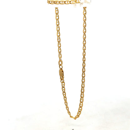 9ct yellow gold bracelet weighing 2.2g with intricate chain links, crafted by Reeves and Sons.