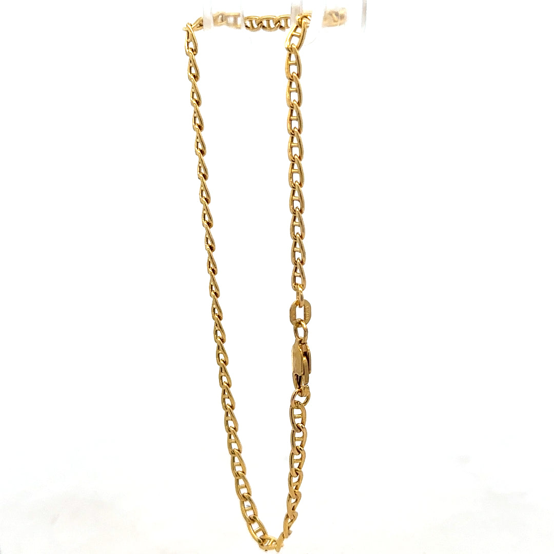 9ct yellow gold bracelet weighing 2.2g, featuring a delicate chain design, from Reeves and Sons.