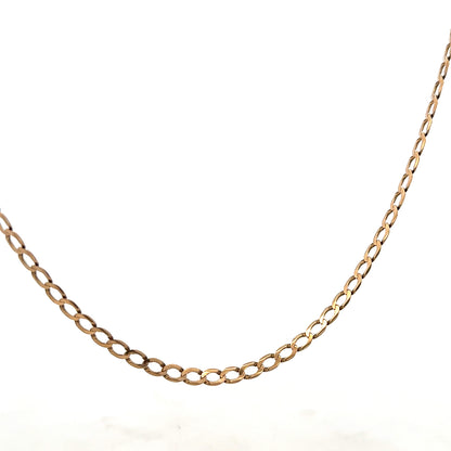 9ct yellow gold curb chain weighing 7.6g, featuring interconnected oval links, crafted by Reeves and Sons.