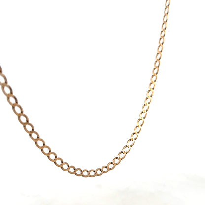 9ct yellow gold curb chain weighing 7.6g, featuring interlocking oval links, crafted by Reeves and Sons.