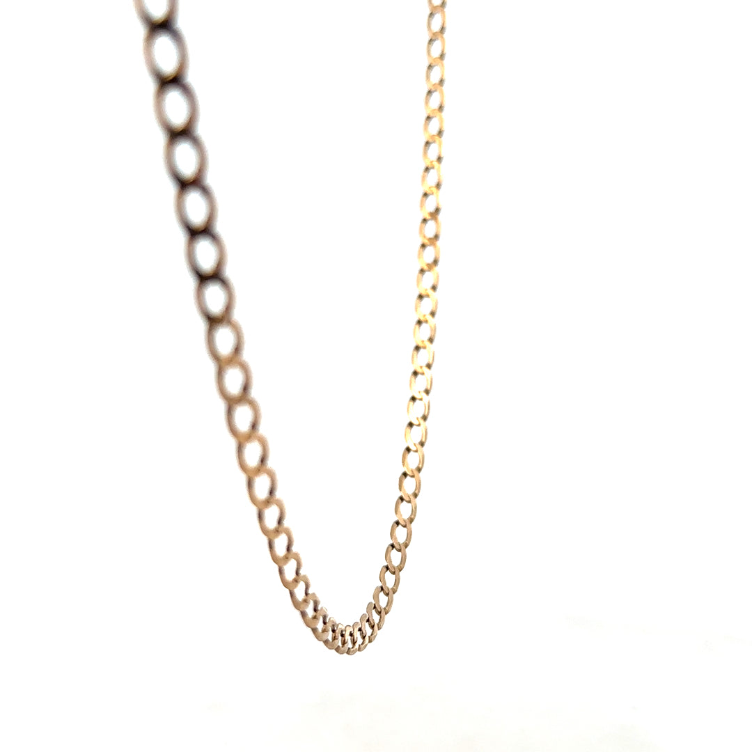 9ct yellow gold curb chain weighing 7.6g, featuring polished links, by Reeves and Sons.