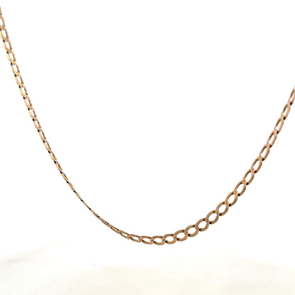9ct yellow gold curb chain weighing 7.6g with a polished finish, featuring closely linked oval-shaped gold links.