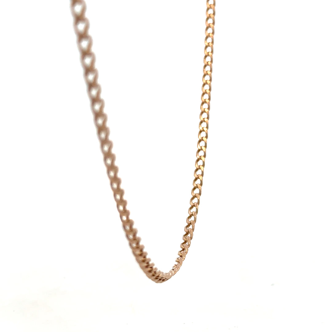 9ct yellow gold chain weighing 15.8g from Reeves and Sons, close-up view showing detailed link design and polished finish.