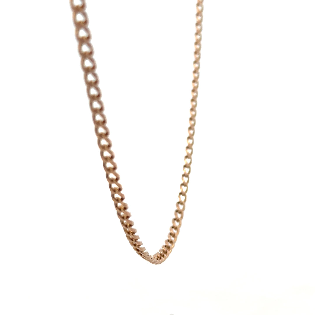 9ct yellow gold chain weighing 15.8g, featuring a classic link design, from Reeves and Sons.