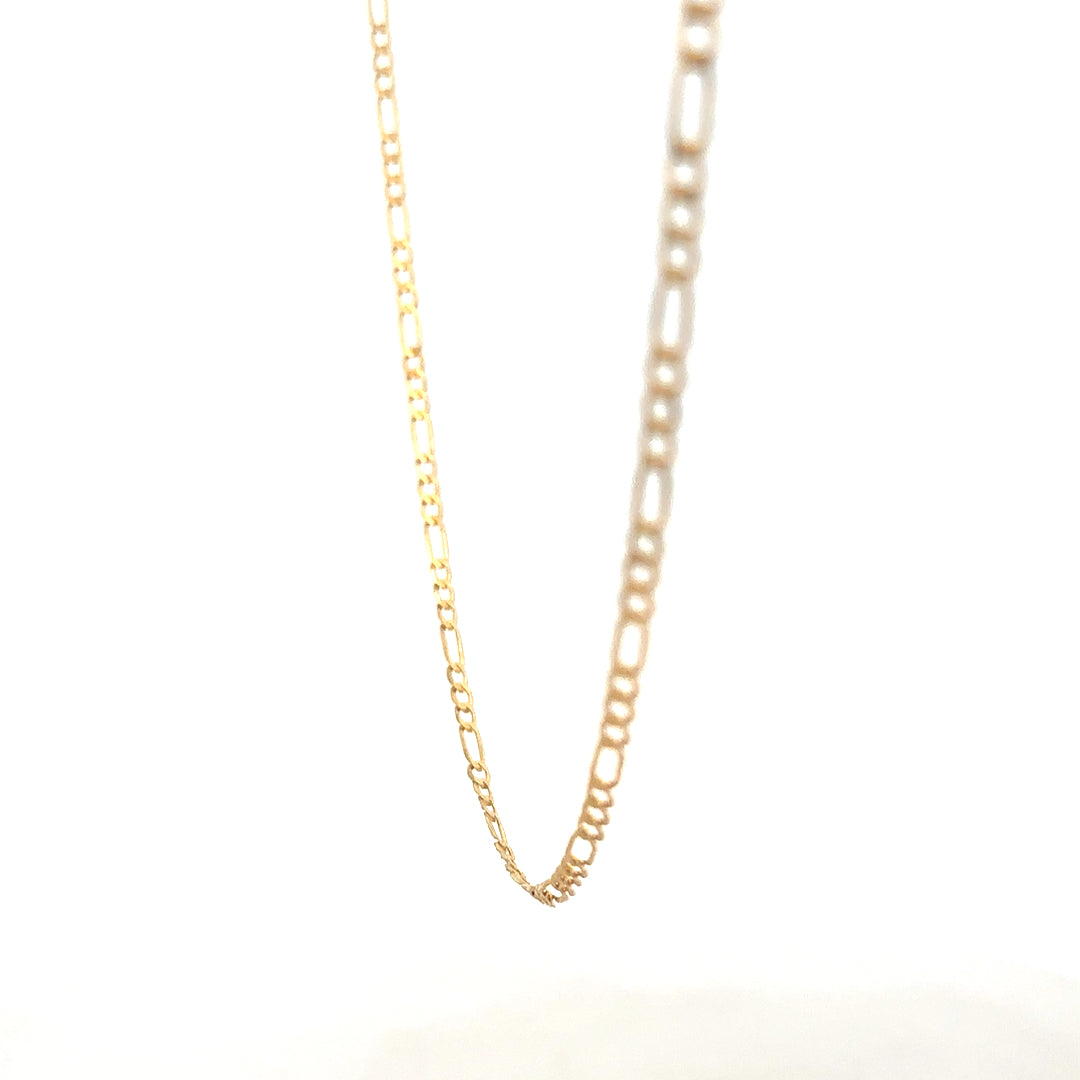 9ct yellow gold Figaro chain from Reeves and Sons, showing a close-up of the 3.3g chain with detailed links.