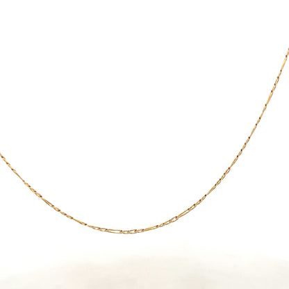9ct yellow gold Figaro chain with a polished finish, weighing 3.3g, featuring interlinked flat and rounded links.