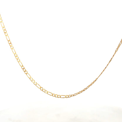 9ct yellow gold figaro chain weighing 3.3g, featuring interlinked oval links, from Reeves and Sons.