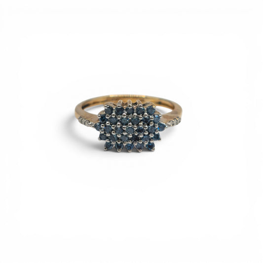 9ct yellow gold diamond ring by Reeves and Sons, featuring a sparkling diamond setting and elegant design.