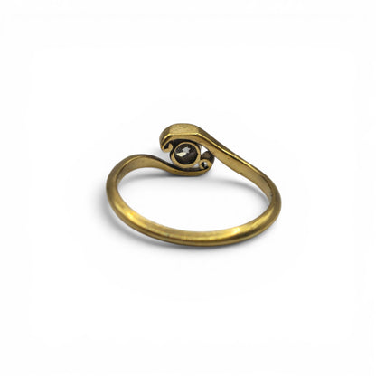 18ct yellow gold diamond ring by Reeves and Sons, featuring a sparkling diamond centerpiece and elegant band design.